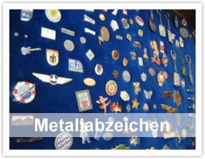 eine grosse auswahl an Metallabzeichen